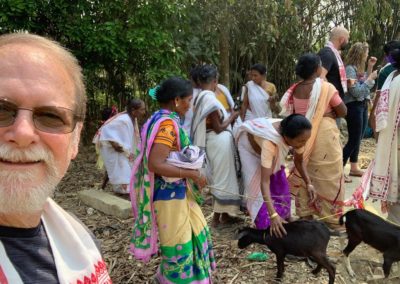 Missionary with Assamese widows and goats